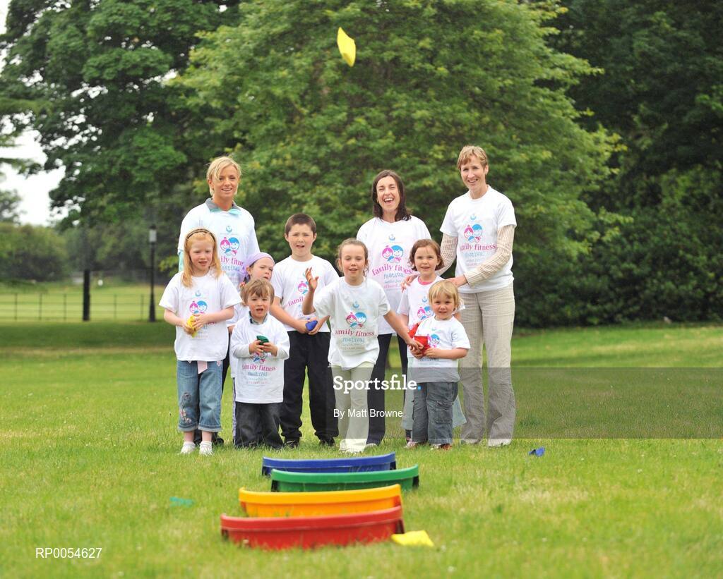 2 July 2008; Lia Brady, aged 9, watched by Irish 3000m runner Roisin McGettigan, Mini-Marathon winner Annette Kealy and former Olympic Runner Catherina McKiernan at the Launch of Athletics Ireland Family Fitness Festival. Farmleigh, Phoenix Park, Dublin. For more information visit www.familyfitnessfestival.ie. Picture credit: Matt Browne / SPORTSFILE