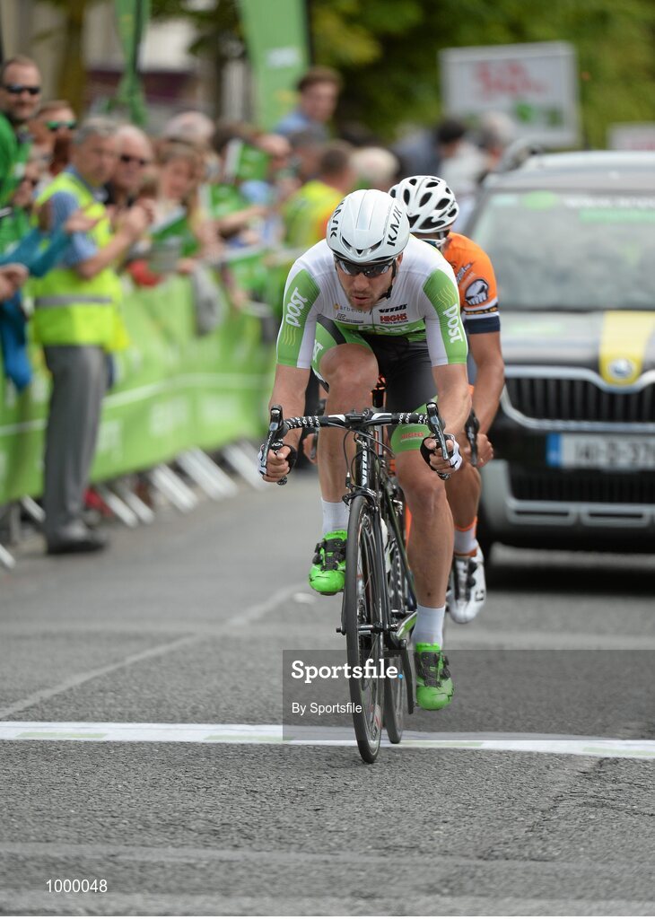 24 May 2015; Aidis Kruopis, An Post Chain Reaction, followed by Davide Vigano, Team IDEA 2010 ASD, make their way through Skerries to begin their final lap during Stage 8 of the 2015 An Post Rás. Drogheda - Skerries. Photo by Sportsfile