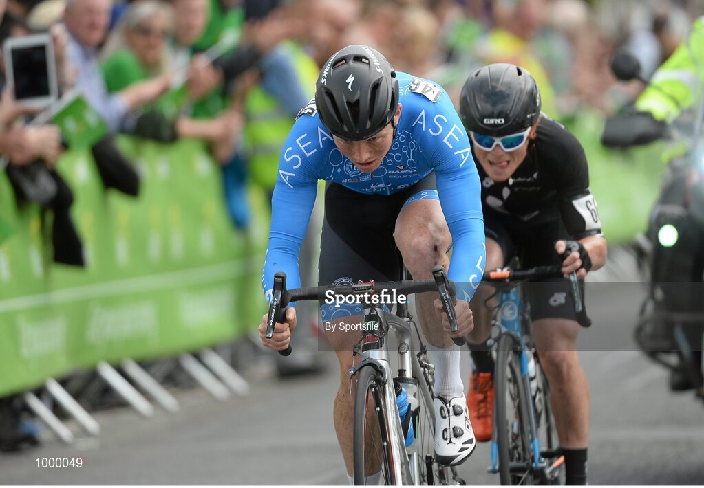 24 May 2015; Damien Shaw, Team Asea, followed by Luke Mudgway, New Zealand National Team, make their way through Skerries to begin their final lap during Stage 8 of the 2015 An Post Rás. Drogheda - Skerries. Photo by Sportsfile