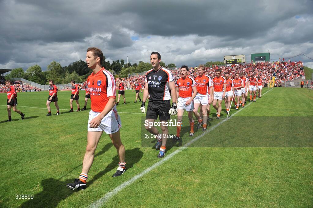 29 June 2008; Paul McGrane, Armagh captain leads the Armagh team before the start of the match. GAA Football Ulster Senior Championship Semi-Final, Down v Armagh, St Tighearnach's Park, Clones, Co. Monaghan. Picture credit: David Maher / SPORTSFILE
