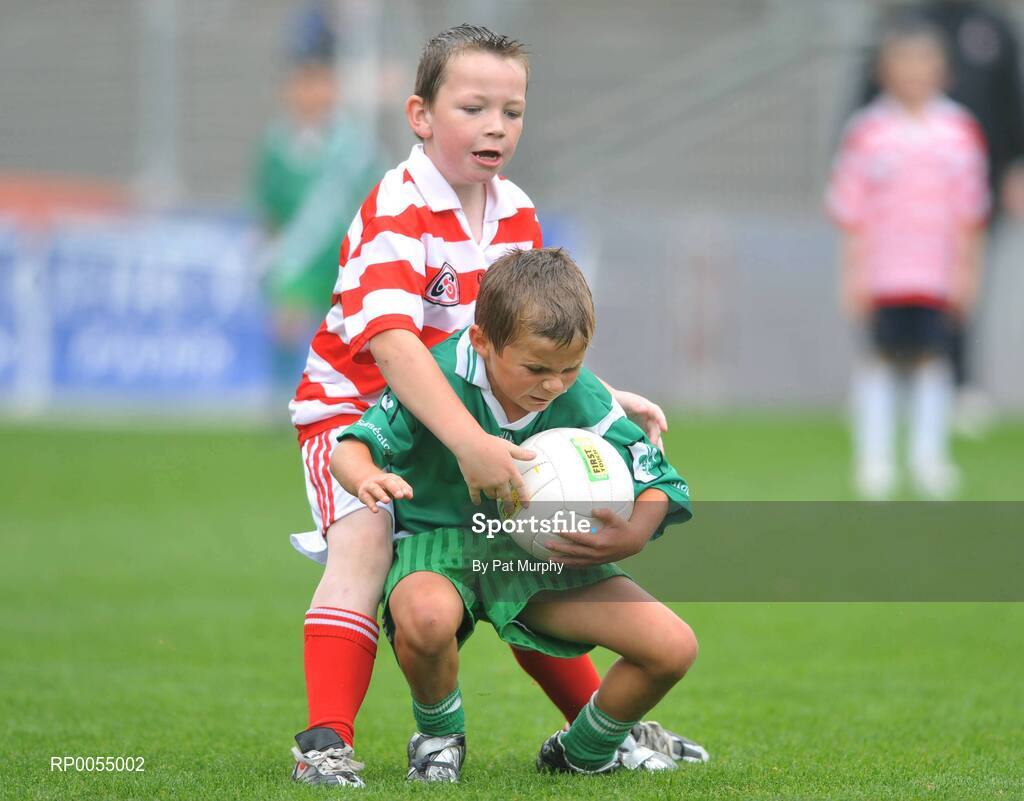 10 July 2008; Karl Hartley, Sarsfields, in action against Evan Lynam, Cappagh, during the Leinster - Play and Stay with GAA Go Games activity day which saw over 700 children take part in games in both hurling and football on six pitches at Croke Park, Dublin. Picture credit: Pat Murphy / SPORTSFILE