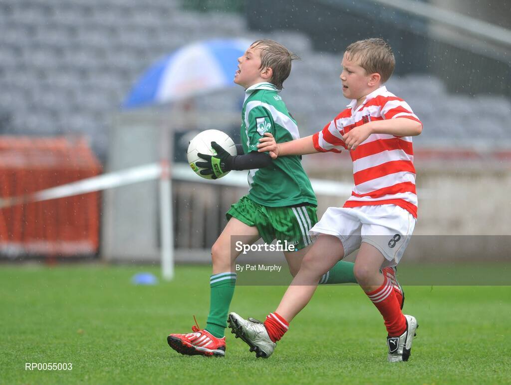 10 July 2008; Billy Campbell, Sarsfields, in action against Tommy Martin, right, Cappagh, during the Leinster - Play and Stay with GAA Go Games activity day which saw over 700 children take part in games in both hurling and football on six pitches at Coke Park, Dublin. Picture credit: Pat Murphy / SPORTSFILE