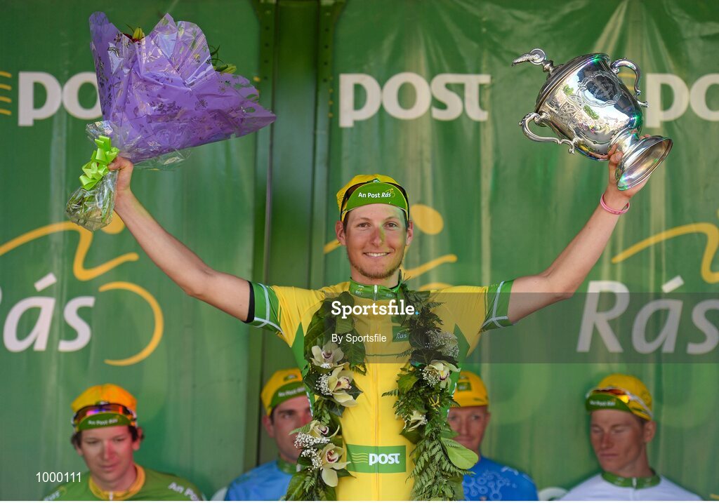 24 May 2015; Lukas Postlberger, Tirol Cycling Team, celebrates on stage after he retained the yellow jersey following Stage 8 of the 2015 An Post Rás. Drogheda - Skerries. Photo by Sportsfile