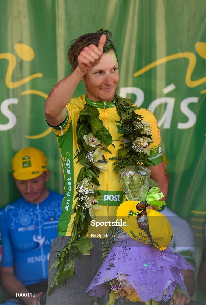 24 May 2015; Lukas Postlberger, Tirol Cycling Team, celebrates on stage after he retained the yellow jersey following Stage 8 of the 2015 An Post Rás. Drogheda - Skerries. Photo by Sportsfile