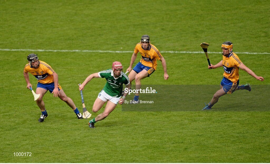 24 May 2015; Paudie O'Brien, Limerick, in action against Clare players, left to right, Gearóid O'Connell, Patrick Donnellan, and John Conlon. Munster GAA Hurling Senior Championship Quarter-Final, Clare v Limerick. Semple Stadium, Thurles, Co. Tipperary. Picture credit: Dáire Brennan / SPORTSFILE
