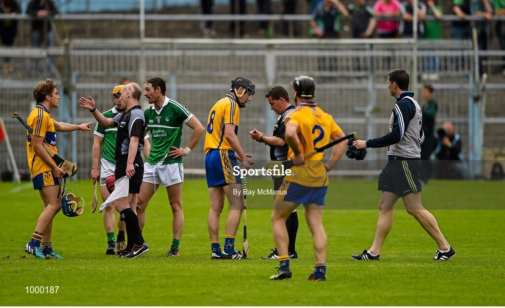 24 May 2015; Referee Colm Lyons speaks to Clare's Patrick Donnellan, 8, before issuing him a red card on the stroke of half time.  Munster GAA Hurling Senior Championship Quarter-Final, Clare v Limerick. Semple Stadium, Thurles, Co. Tipperary. Picture credit: Ray McManus / SPORTSFILE