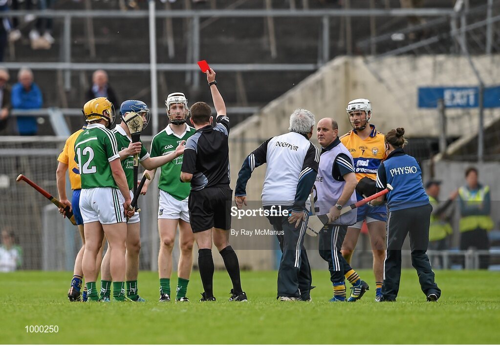 24 May 2015; Limerick substitute Sean Tobin, in the blue helmet, is shown a red card by referee Colm Lyons. Munster GAA Hurling Senior Championship Quarter-Final, Clare v Limerick. Semple Stadium, Thurles, Co. Tipperary. Picture credit: Ray McManus / SPORTSFILE