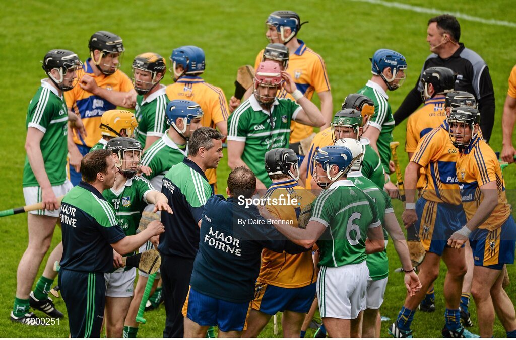 24 May 2015; Limerick manager TJ Ryan attempts to diffuse an incident at the end of the first half which resulted in Patrick Donnellan, Clare, recieving a red card. Munster GAA Hurling Senior Championship Quarter-Final, Clare v Limerick. Semple Stadium, Thurles, Co. Tipperary. Picture credit: Dáire Brennan / SPORTSFILE