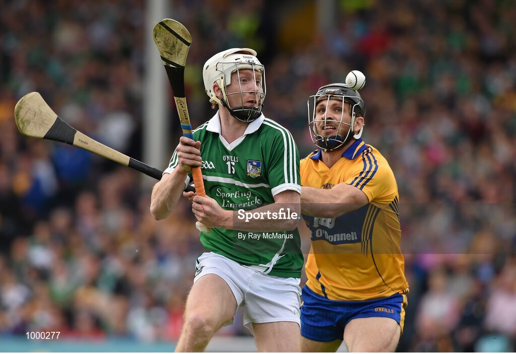 24 May 2015; Cian Lynch, Limerick, in action against Domhnall O'Donovan, Clare. Munster GAA Hurling Senior Championship Quarter-Final, Clare v Limerick. Semple Stadium, Thurles, Co. Tipperary. Picture credit: Ray McManus / SPORTSFILE