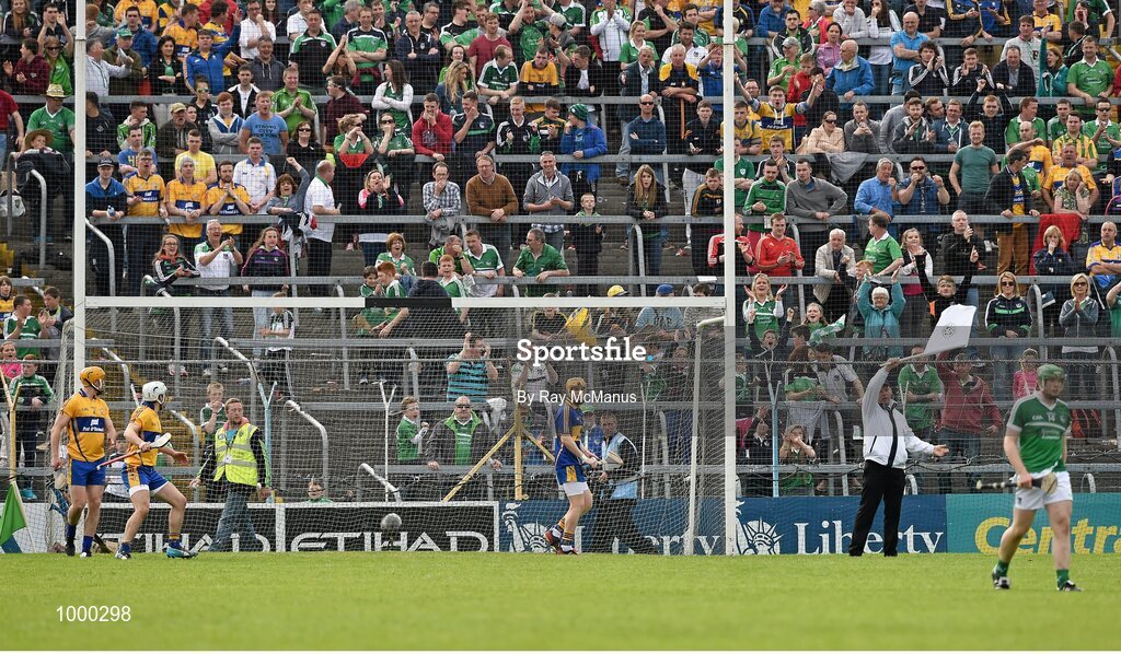24 May 2015; An umpire waves a white flag to signal a point for Limerick, from a free by Shane Dowling, in the 62nd minute. Munster GAA Hurling Senior Championship Quarter-Final, Clare v Limerick. Semple Stadium, Thurles, Co. Tipperary. Picture credit: Ray McManus / SPORTSFILE