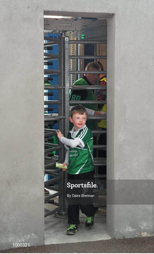 24 May 2015; Christian Higgins, aged 6, from Herbertstown, Co. Limerick, makes his way through the turnstile. Munster GAA Hurling Senior Championship Quarter-Final, Clare v Limerick. Semple Stadium, Thurles, Co. Tipperary. Picture credit: Dáire Brennan / SPORTSFILE
