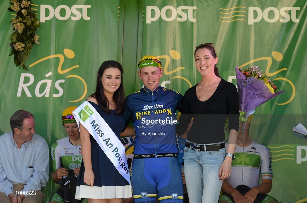 24 May 2015; Category 2 winner Gary Sheehan, Bikeworx, with Miss An Post Rás Aisling Halpin and Maria Connaughton, Spin11, following Stage 8 of the 2015 An Post Rás. Drogheda - Skerries. Photo by Sportsfile