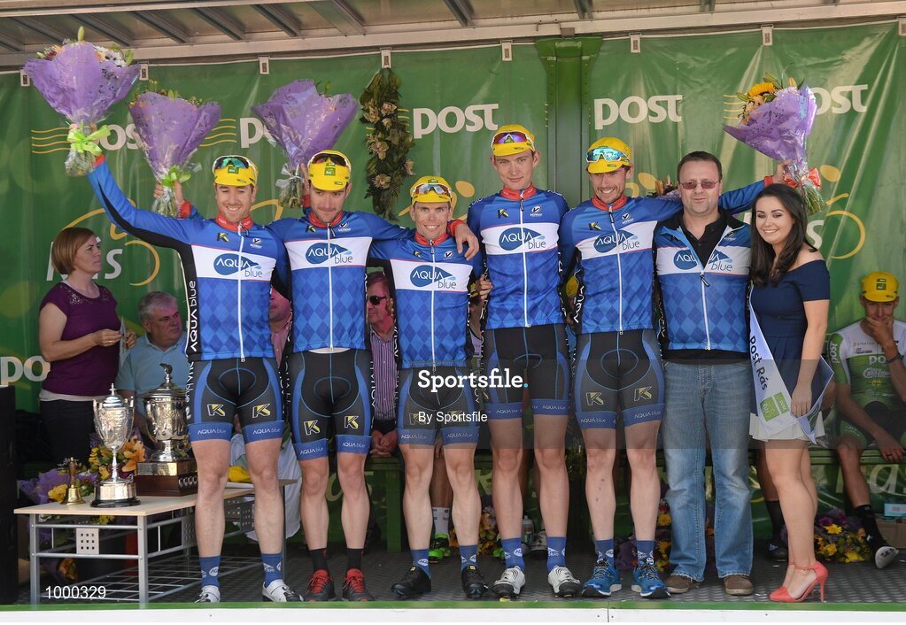 24 May 2015; County team winners Aquablue from Cork with Miss An Post Rás Aisling Halpin following Stage 8 of the 2015 An Post Rás. Drogheda - Skerries. Photo by Sportsfile