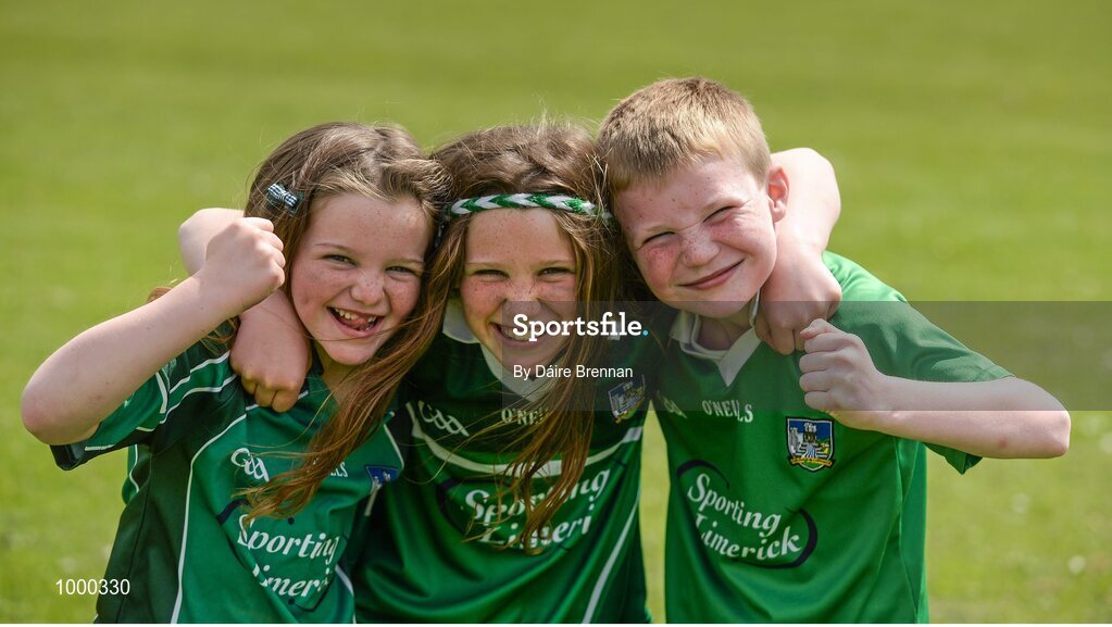 24 May 2015; Limerick supporters, left to right, sisters Grace Fitzgibbon, aged 7, Rebecca Fitzgibbon, aged 9, and their cousin Cian Fitzgibbon, aged 7, from Shanagolden, Co. Limerick. Munster GAA Hurling Senior Championship Quarter-Final, Clare v Limerick. Semple Stadium, Thurles, Co. Tipperary. Picture credit: Dáire Brennan / SPORTSFILE