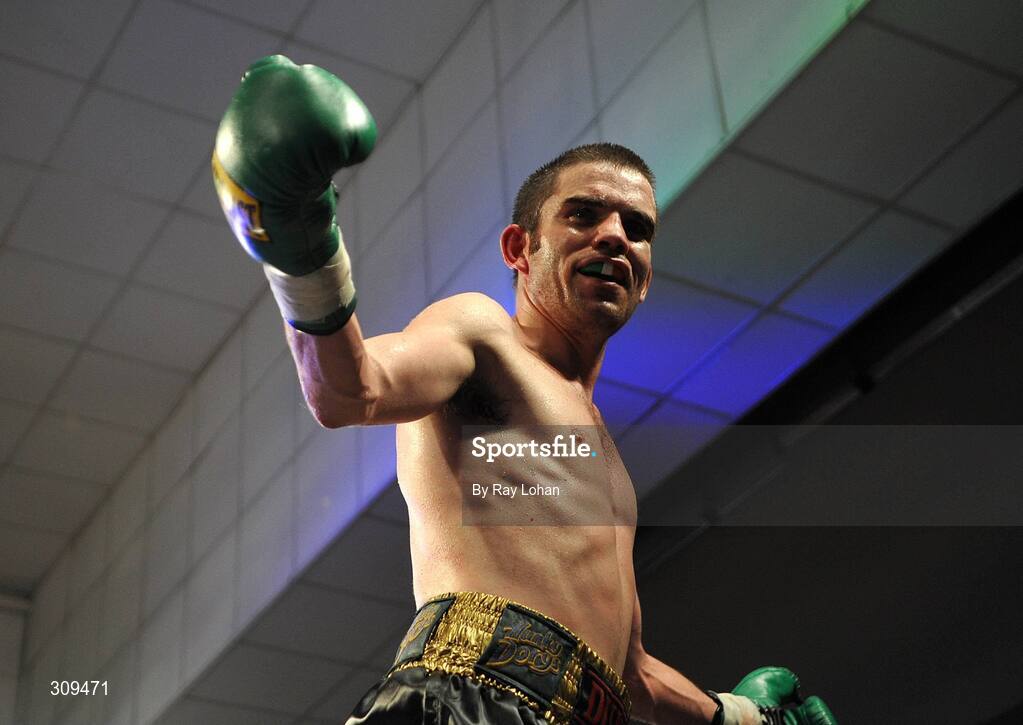 12 July 2008; Bernard Dunne celebrates to the crowd after defeating Damian Marchiano to win the International Super Bantamweight, Hunky Dory Fight Night, Irish Lighweight Championship, National Stadium, Dublin. Picture credit: Ray Lohan / SPORTSFILE *** Local Caption ***