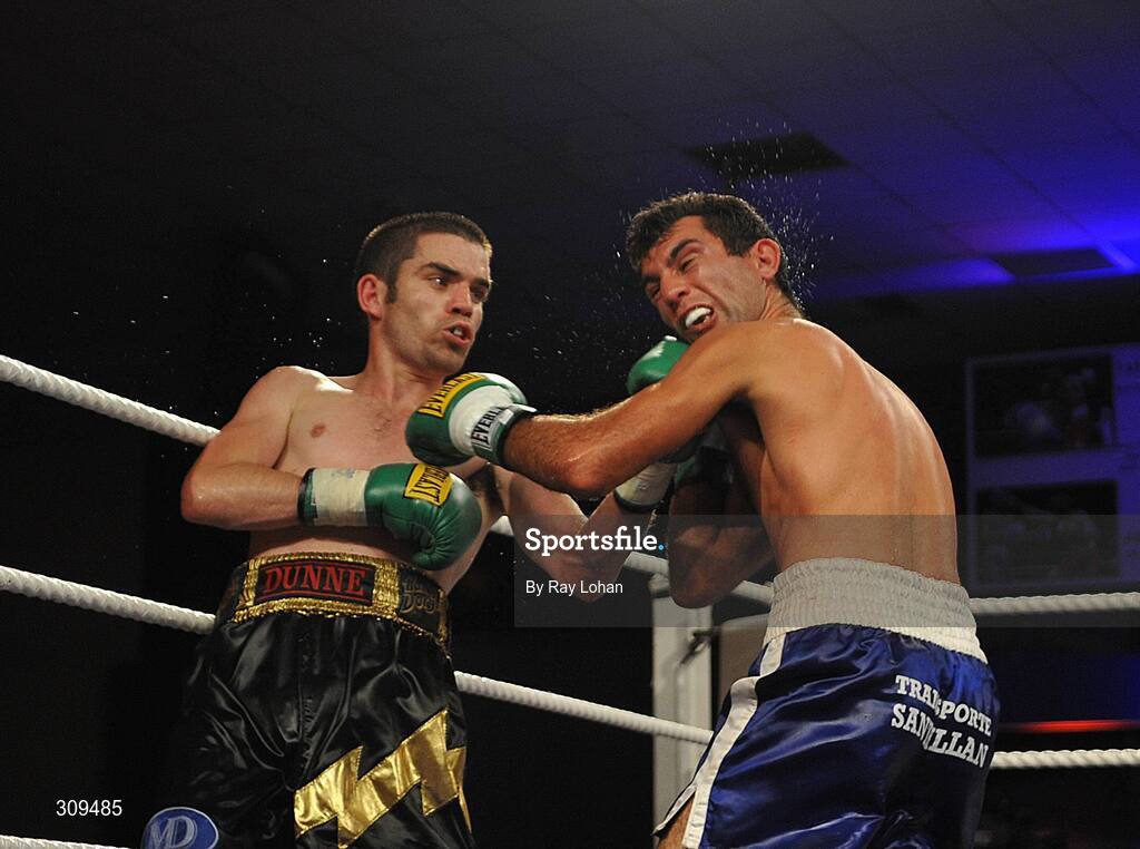 12 July 2008; Bernard Dunne, left, lands a punch on Damian Marchiano. International Super Bantamweight, Hunky Dory Fight Night, Irish Lighweight Championship, National Stadium, Dublin. Picture credit: Ray Lohan / SPORTSFILE *** Local Caption ***