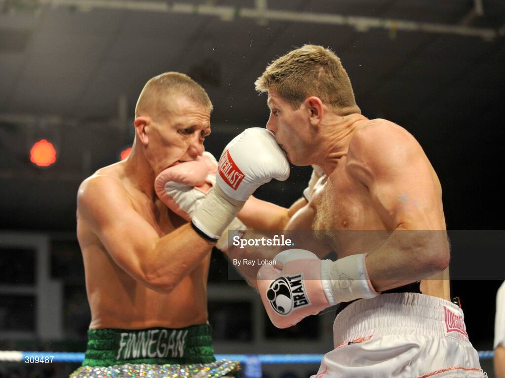12 July 2008; Jim Rock, right, lands a punch on Jonjo Finnegan. Irish Light-Heavy Weight Championship, Hunky Dory Fight Night, Irish Lighweight Championship, National Stadium, Dublin. Picture credit: Ray Lohan / SPORTSFILE *** Local Caption ***