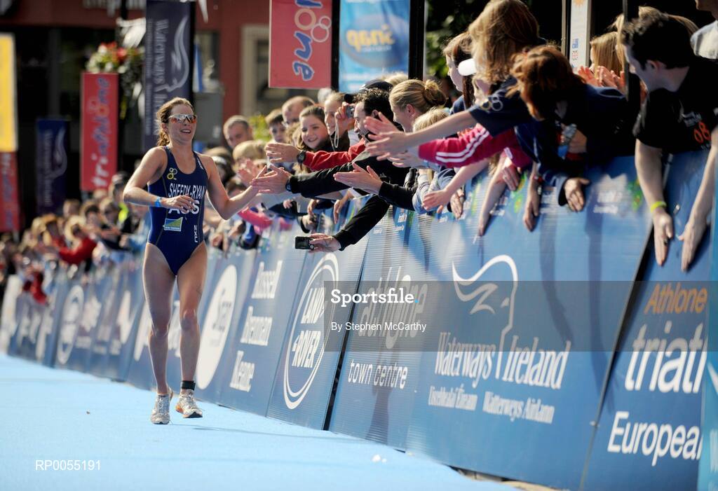 12 July 2008; Eventual third place Felicity Sheedy-Ryan, Australia, celebrates with fans as she approachs the finish line during the running discipline of the Women's Elite Race at the triAthlone event. Over 1,500 competitors took part in the third running of triAthlone sponsored by Waterways Ireland. triAthlone will host the European Triathlon Championships in 2010, the first time the event has ever been held in Ireland. Waterways Ireland triAthlone Triathlon, Athlone, Co. Westmeath. Picture credit: Stephen McCarthy / SPORTSFILE