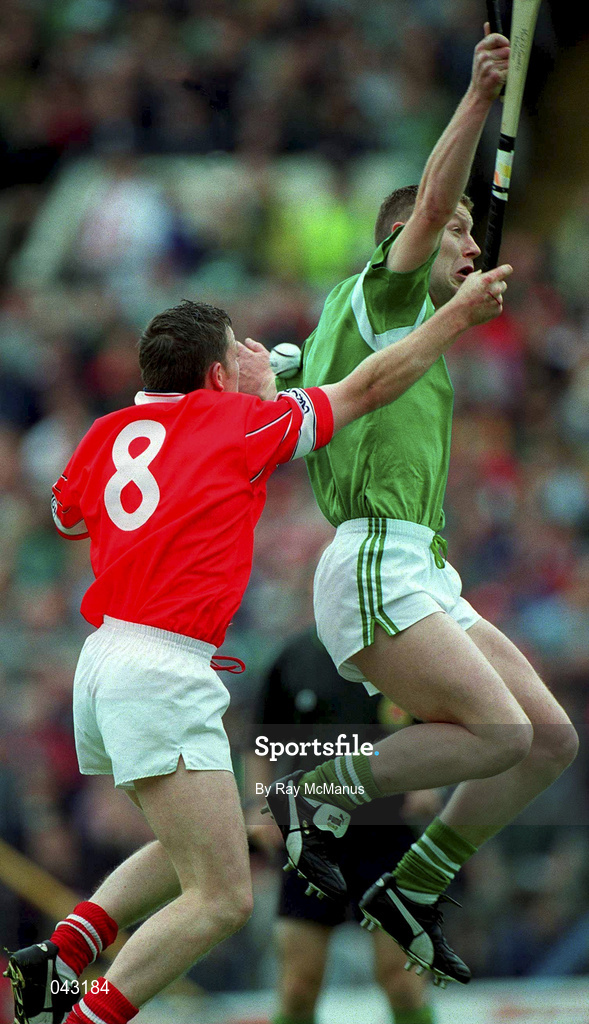 4 June 2000; Michael O'Connell of Cork in action against Ciaran Carey of Limerick during the Guinness Munster Senior Hurling Championship Semi-Final match between Cork and Limerick at Semple Stadium in Thurles, Tipperary. Photo by Ray McManus/Sportsfile