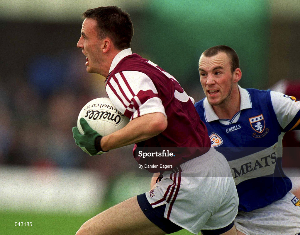 5 June 2000; Damien Healy of Westmeath in action against Paul Dunne of Laois during the Bank of Ireland Leinster Senior Football Championship Quarter-Final match between Westmeath and Laois at O'Connor Park in Tullamore, Offaly. Photo by Damien Eagers/Sportsfile