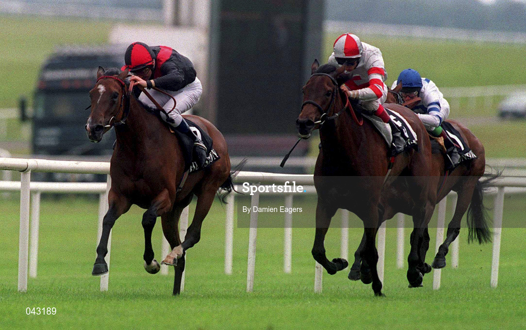 1 July 2000; Lady Upstage, with Michael Hills up, left, on the way to winning The Hunston Financial Pretty Polly Stakes from Preseli, with Eddie Ahern up, 5, and Lady in Waiting with Johnny Murtagh up, at the Curragh Racecourse in Kildare. Photo by Damien Eagers/Sportsfile