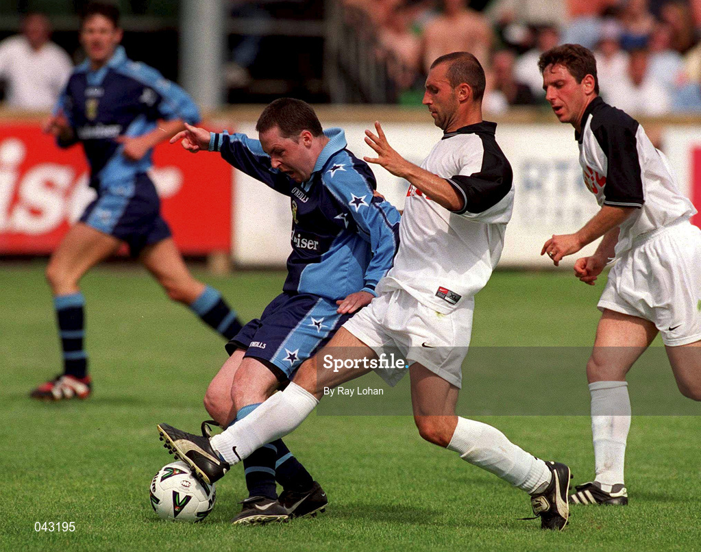 18 June 2000; Mick O'Byrne of UCD in action against Petyr Kolev of Velbazhd Kyustendil during the UEFA Intertoto Cup First Round First Leg match between UCD and Velbazhd Kyustendil at Belfield Park in Dublin. Photo by Ray Lohan/Sportsfile