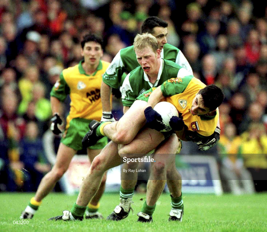 11 June 2000; Paddy Campbell of Donegal in action against Liam McBarron of Fermanagh during the Bank of Ireland Ulster Senior Football Championship Quarter-Final match between Donegal and Fermanagh at MacCumhail Park in Ballybofey, Donegal. Photo by Ray Lohan/Sportsfile