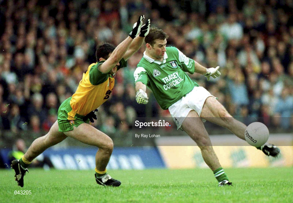 11 June 2000; Raymond Gallagher of Fermanagh in action against Mark Crossan of Donegal during the Bank of Ireland Ulster Senior Football Championship Quarter-Final match between Donegal and Fermanagh at MacCumhail Park in Ballybofey, Donegal. Photo by Ray Lohan/Sportsfile