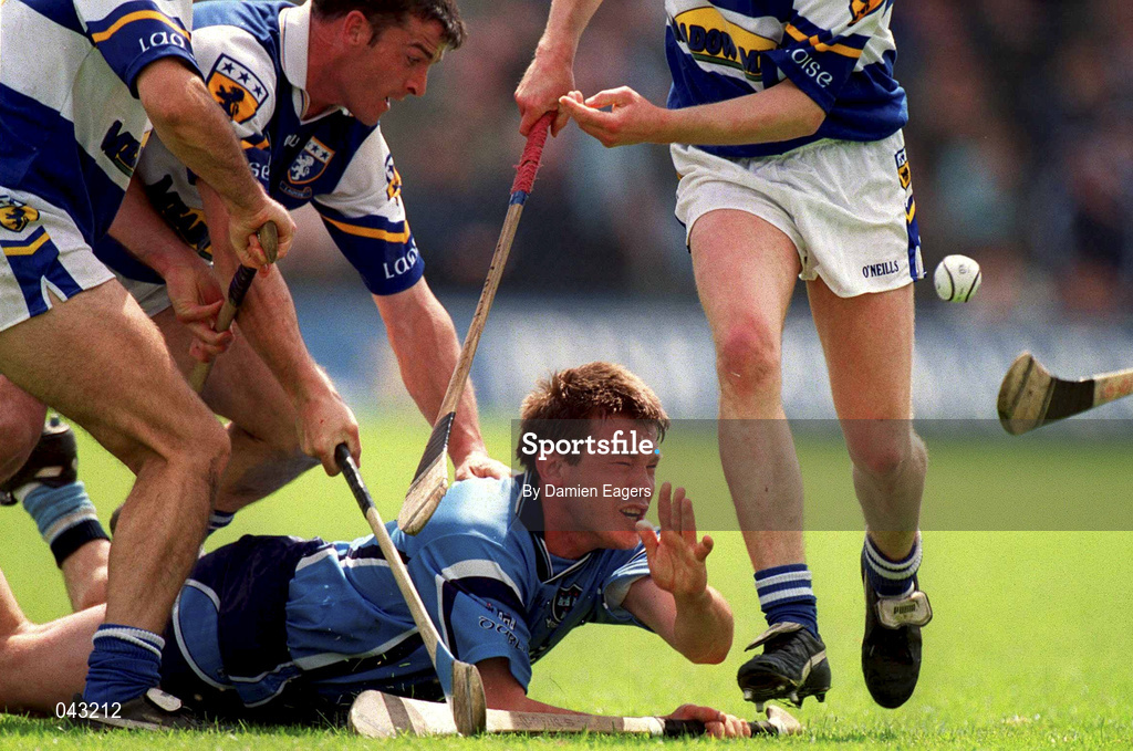5 June 2000; Sean Duignan of Dublin hand passes the ball away during the Guinness Leinster Senior Hurling Championship Play-off match between Dublin and Laois at O'Connor Park in Tullamore, Offaly. Photo by Damien Eagers/Sportsfile