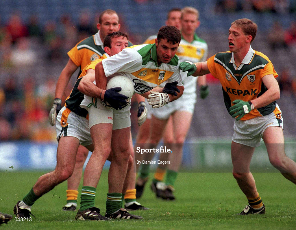 4 June 2000; Sean Grennan of Offaly is tackled by Evan Kelly, left, and Trevor Giles of Meath during the Bank of Ireland Leinster Senior Football Championship Quarter-Final match between Offaly and Meath at Croke Park in Dublin. Photo by Damien Eagers/Sportsfile