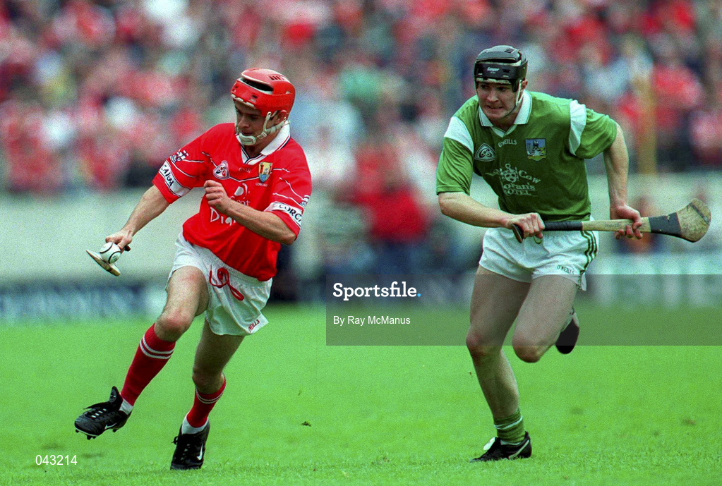 4 June 2000; Sean McGrath of Cork in action against Stephen Lucey of Limerick during the Guinness Munster Senior Hurling Championship Semi-Final match between Cork and Limerick at Semple Stadium in Thurles, Tipperary. Photo by Ray McManus/Sportsfile
