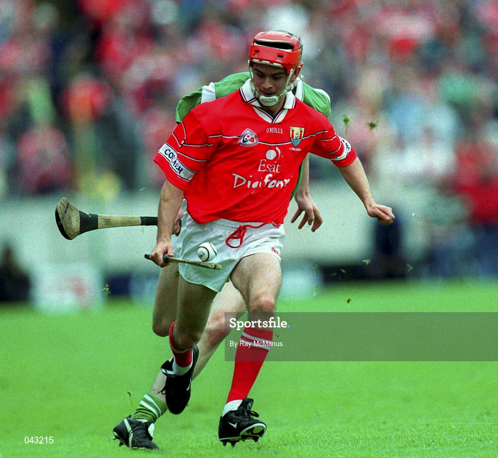 4 June 2000; Sean McGrath of Cork in action against Stephen Lucey of Limerick during the Guinness Munster Senior Hurling Championship Semi-Final match between Cork and Limerick at Semple Stadium in Thurles, Tipperary. Photo by Ray McManus/Sportsfile