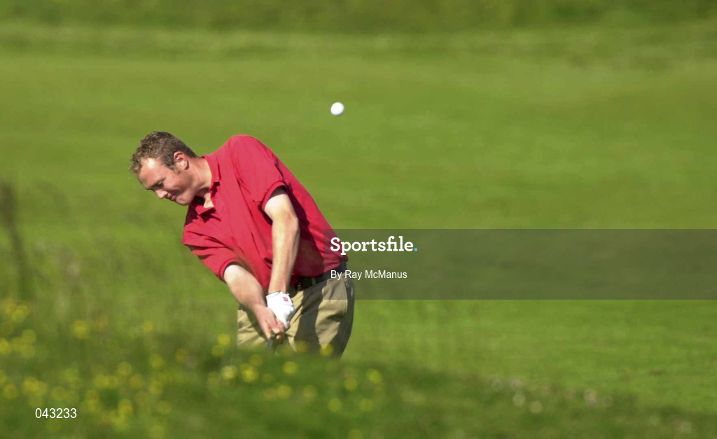 6 June 2000; David Mortimer of Connemara Golf Club plays his second shot to the 14th during the final round of the East of Ireland Championship at County Louth Golf Club in Baltray, Louth. Photo by Ray McManus/Sportsfile