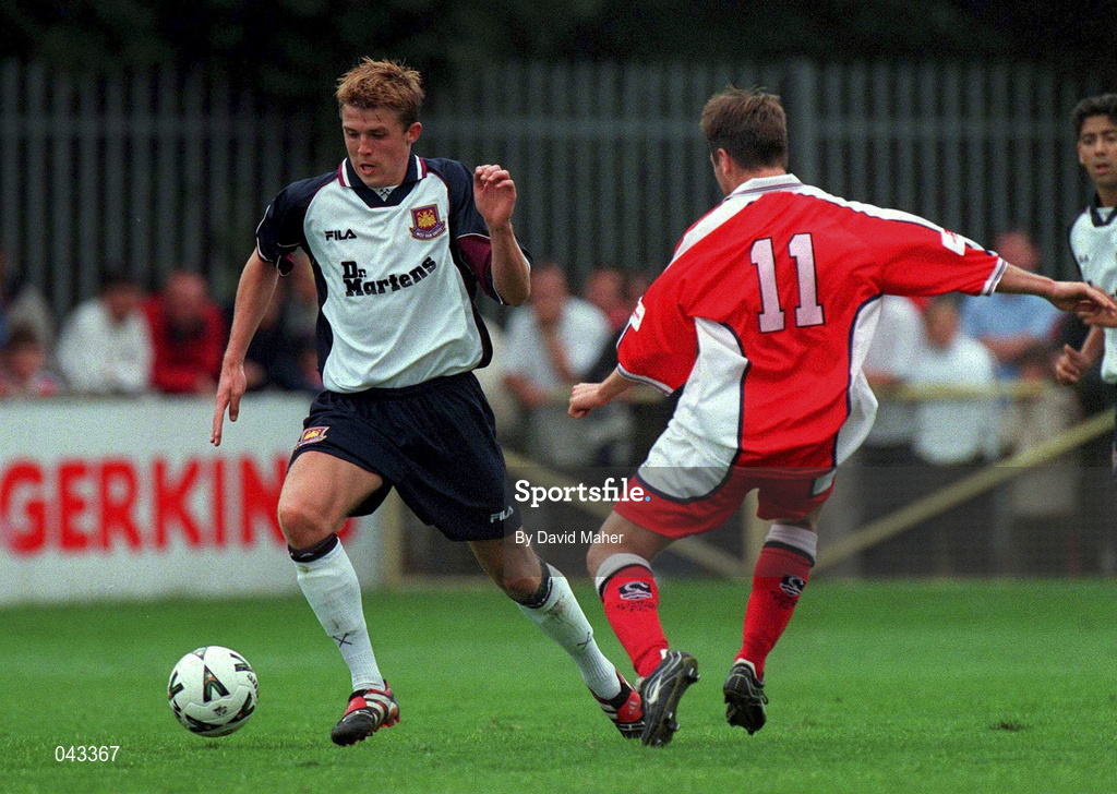 23 July 2000; Michael Carrick of West Ham United in action against Padraig Drew of St Patrick's Athletic during the Pre-Season Friendly match between St Patrick's Athletic and West Ham United at Richmond Park in Dublin. Photo by David Maher/Sportsfile