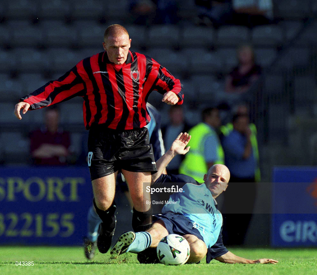22 July 2000; Glen Crowe of Bohemians is tackled by Gareth Roberts of Tranmere Rovers during the Derek Swan Testimonial match between Bohemians and Tranmere Rovers at Dalymount Park in Dublin. Photo by David Maher/Sportsfile