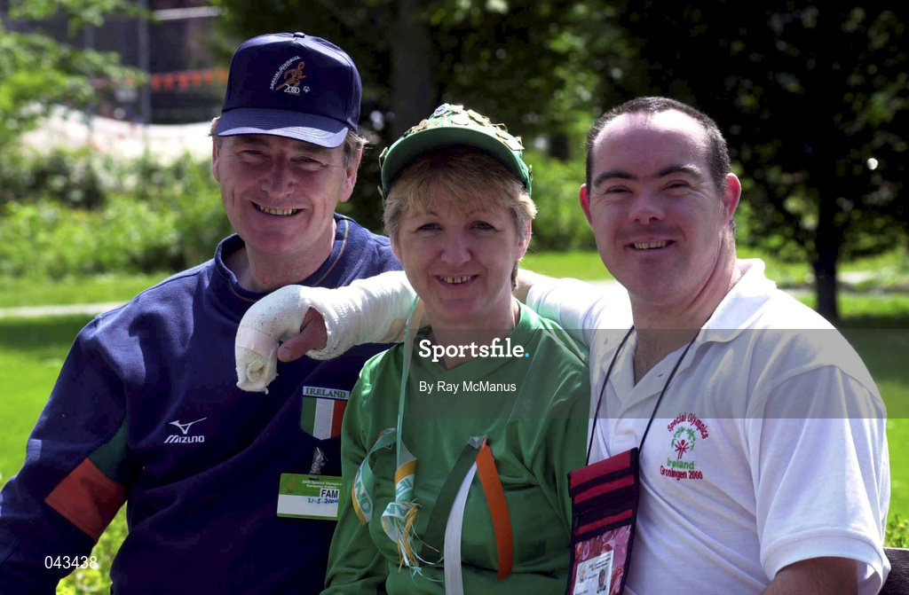 31 May 2000; Ireland's David Sheehan, from Tramore, Waterford, with his sister Bridie Coyne and brother Bernard relax during the Special Olympics European Games at Groningen, Netherlands. David discolated a thumb playing Basketball for Ireland in their first game against Azerbaijan. Photo by Ray McManus/Sportsfile