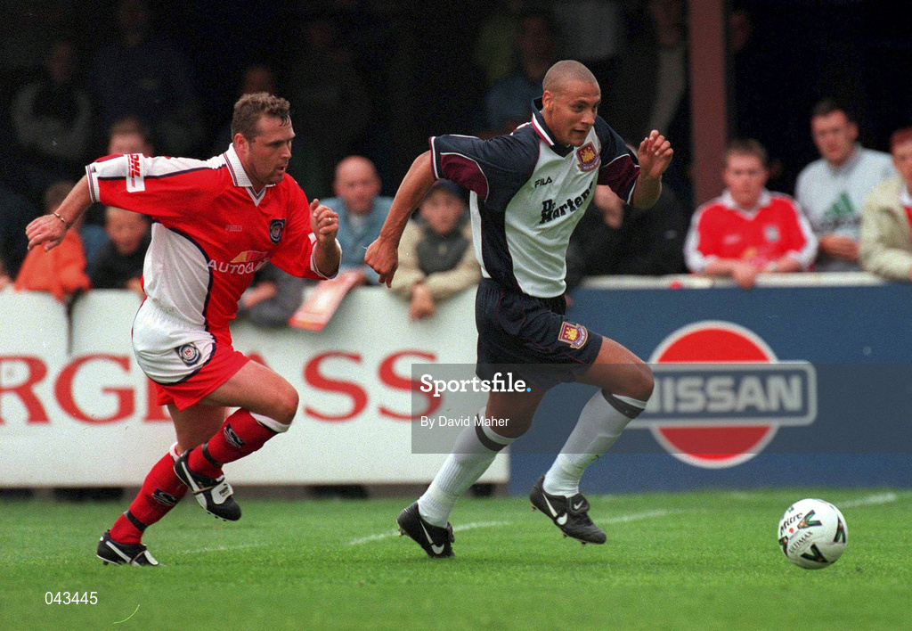23 July 2000; Rio Ferdinand of West Ham United in action against Paul Byrne of St Patrick's Athletic during the Pre-Season Friendly match between St Patrick's Athletic and West Ham United at Richmond Park in Dublin. Photo by David Maher/Sportsfile