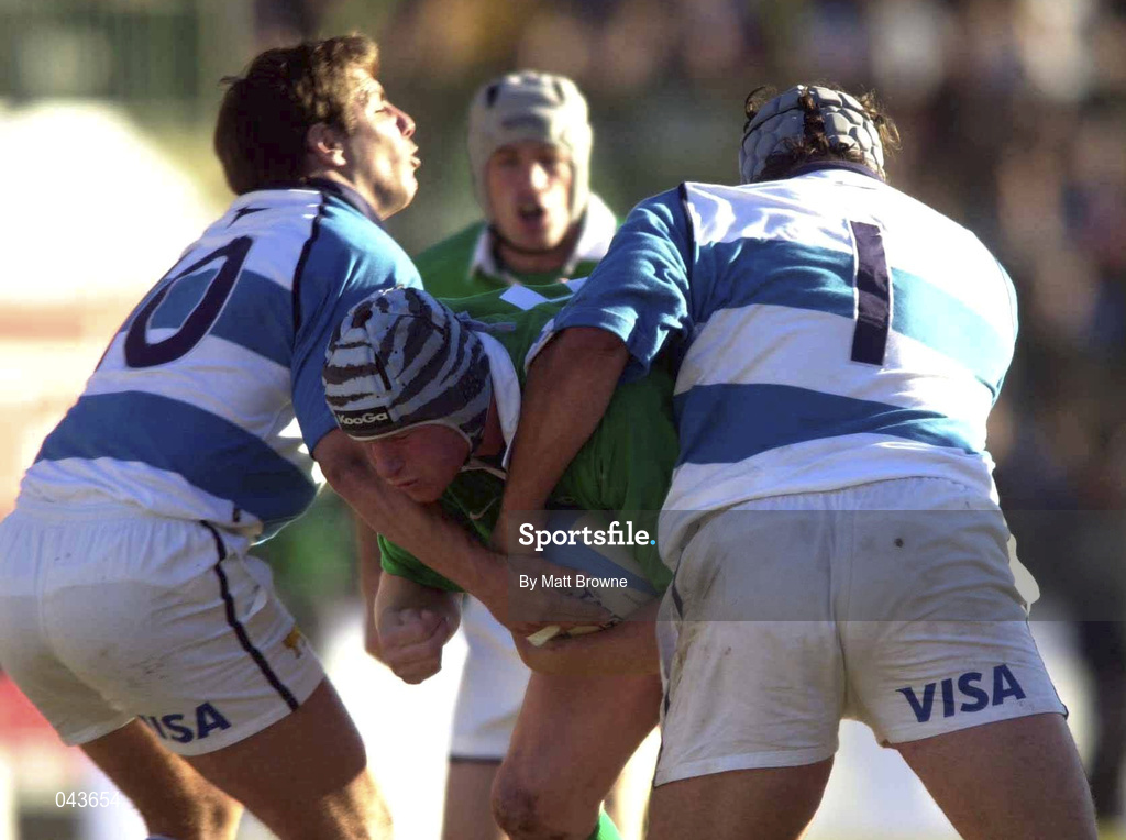 3 June 2000; Guy Easterby of Ireland is tackled by Gonzalo Quesada and Mauricio Reggardio of Argentina during the Rugby International match between Argentina and Ireland at Estadio Arquitecto Ricardo Etcheverri in Buenos Airies, Argentina. Photo by Matt Browne/Sportsfile