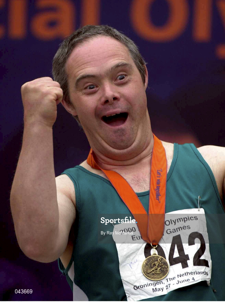 1 June 2000; Ireland's Peter McGrath celebrates after he was presented with a gold medal after winning the 100m athletics event at the Special Olympics European Games in Groningen, Netherlands. Photo by Ray McManus/Sportsfile