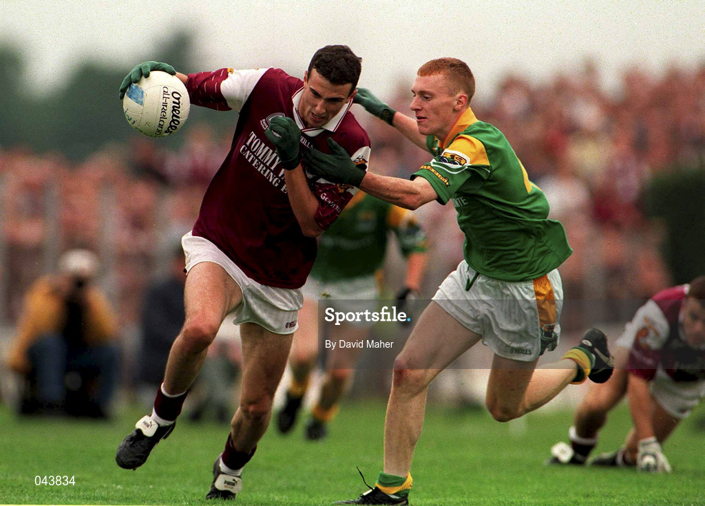 30 July 2000; Galway's Joe Bergin gets past Leitrim's Michael McGuinness during the Bank of Ireland Connacht Senior Football Championship Final between Galway and Leitrim at Dr Hyde Park in Roscommon. Photo by David Maher/Sportsfile