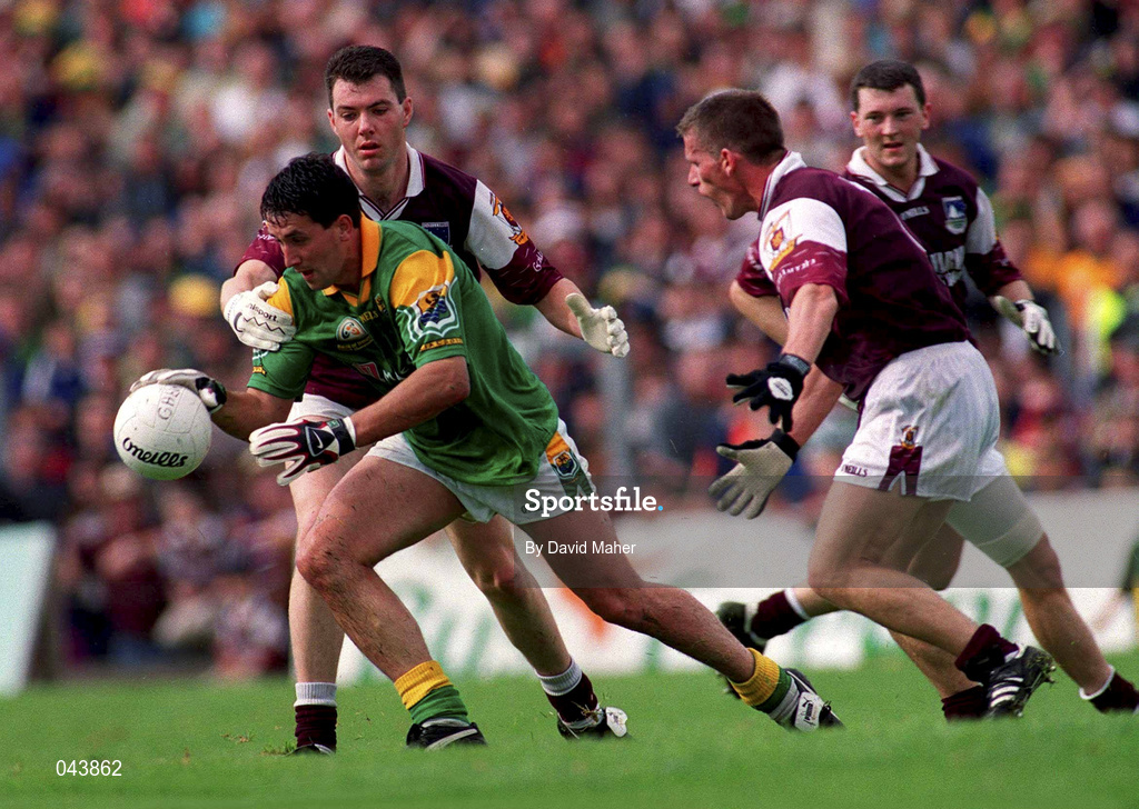 30 July 2000; Seamus Quinn of Leitrim is tackled by Sean O'Domhnaill, left, and Seán Óg de Paor of Galway during the Bank of Ireland Connacht Senior Football Championship Final between Galway and Leitrim at Dr Hyde Park in Roscommon. Photo by David Maher/Sportsfile