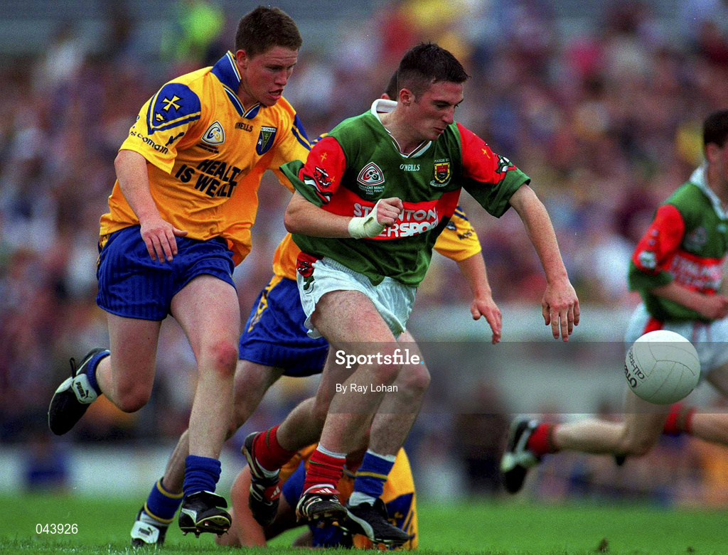30 July 2000; Alan Dillon of Mayo in action against John Nolan of Roscommon during the Connacht Minor Football Championship Final between Roscommon and Mayo at Dr Hyde Park in Roscommon. Photo by Ray Lohan/Sportsfile