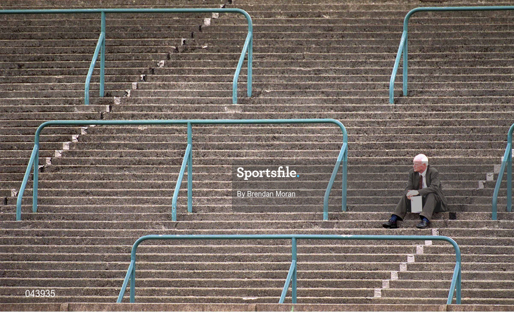 29 July 2000; A spectator watches the action from the terraces during the Dublin International Games at at Morton Stadium in Santry, Dublin. Photo by Brendan Moran/Sportsfile