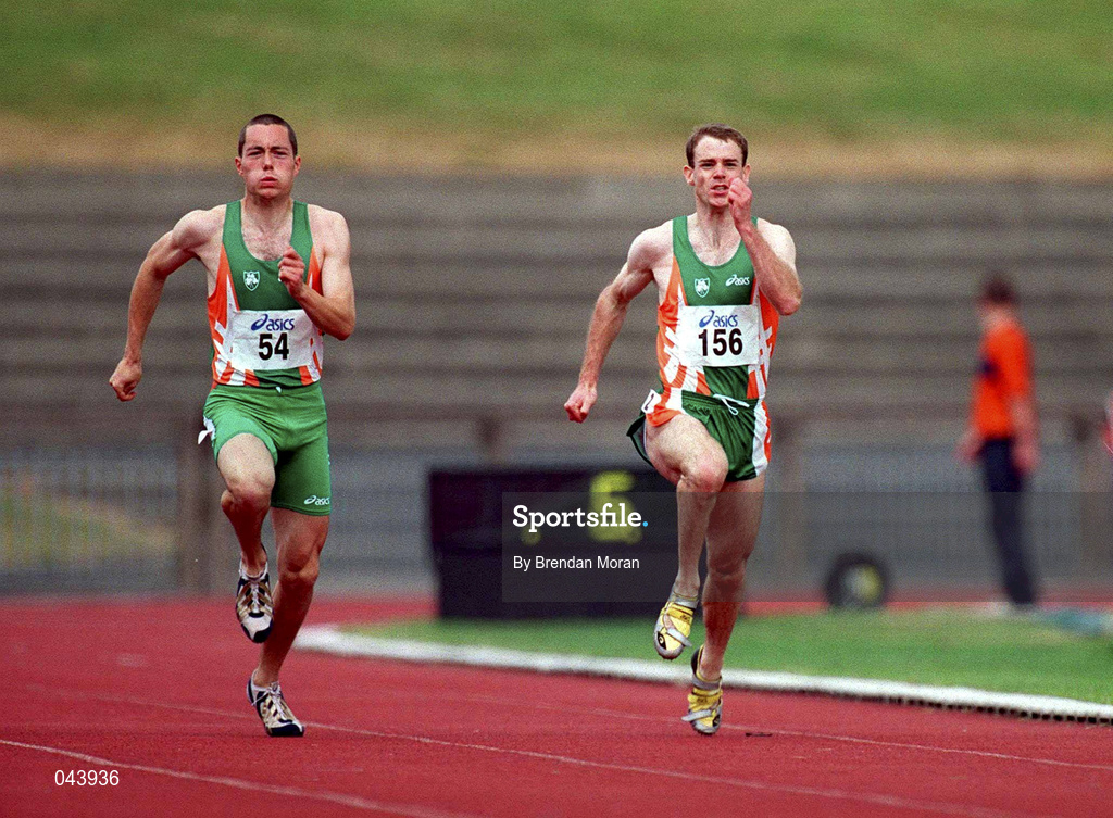 29 July 2000; Mark Howard, 54, on his way to finishing second in the men's 100m event, from eventual third place Tom Comyns, 156, during the Dublin International Games at at Morton Stadium in Santry, Dublin. Photo by Brendan Moran/Sportsfile