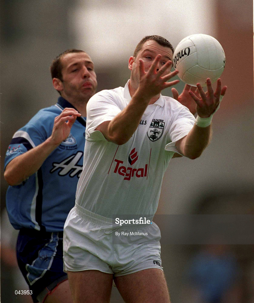 30 July 2000; Ronan Quinn of Kildare in action against Ian Robertson of Dublin during the Bank of Ireland Leinster Senior Football Championship Final between Dublin and Kildare at Croke Park in Dublin. Photo by Ray McManus/Sportsfile