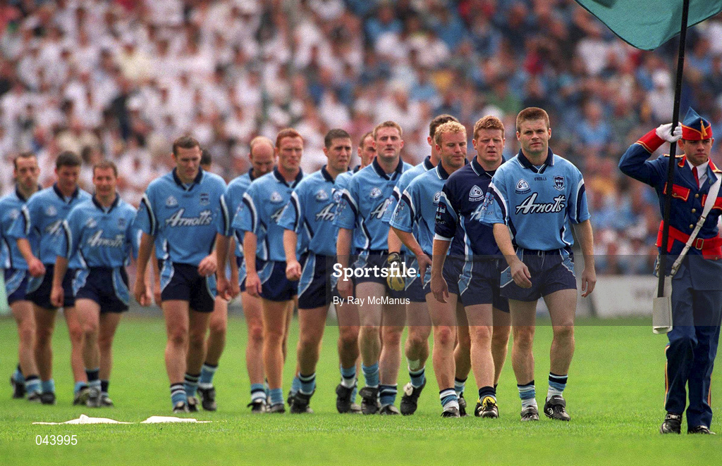 30 July 2000; Dublin captain Dessie Farrell leads his team in the pre-match parade prior to the Bank of Ireland Leinster Senior Football Championship Final between Dublin and Kildare at Croke Park in Dublin. Photo by Ray McManus/Sportsfile