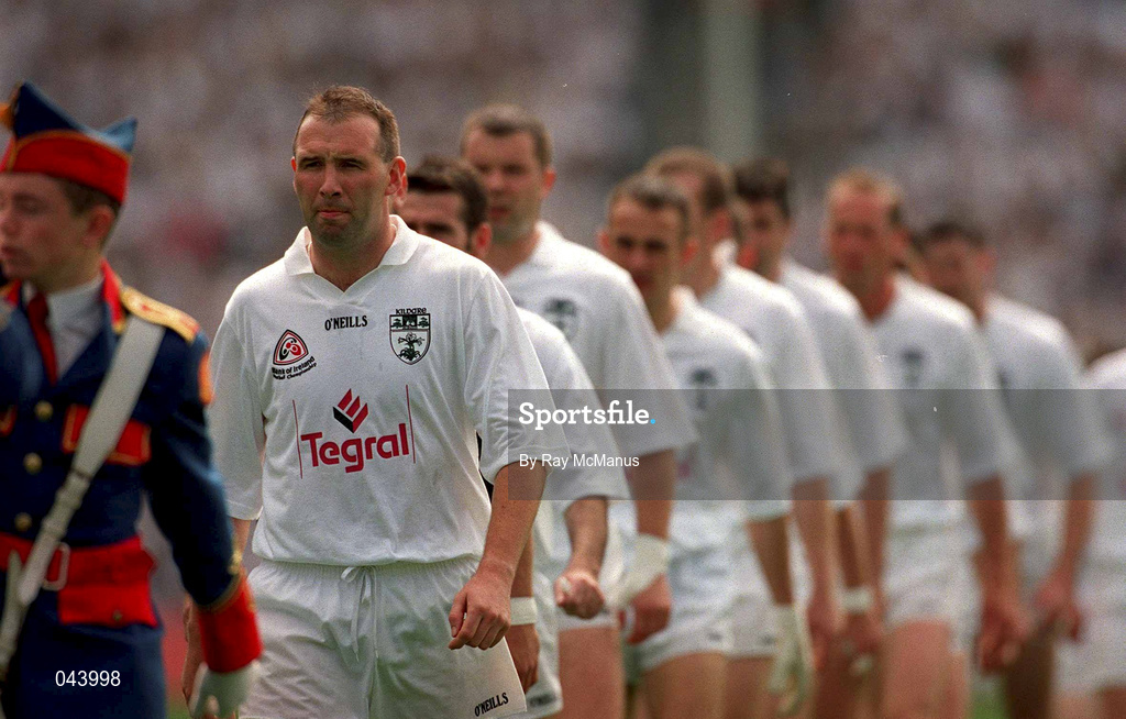 30 July 2000; Kildare captain Glenn Ryan leads his team during the pre-match parade prior to the Bank of Ireland Leinster Senior Football Championship Final between Dublin and Kildare at Croke Park in Dublin. Photo by Ray McManus/Sportsfile