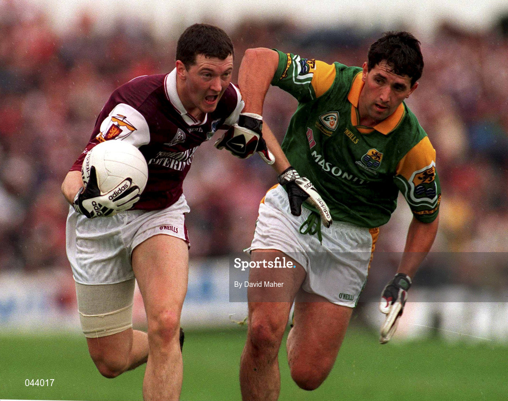 30 July 2000; Jason Killeen of Galway is tackled by Seamus Quinn of Leitrim during the Bank of Ireland Connacht Senior Football Championship Final between Galway and Leitrim at Dr Hyde Park in Roscommon. Photo by David Maher/Sportsfile
