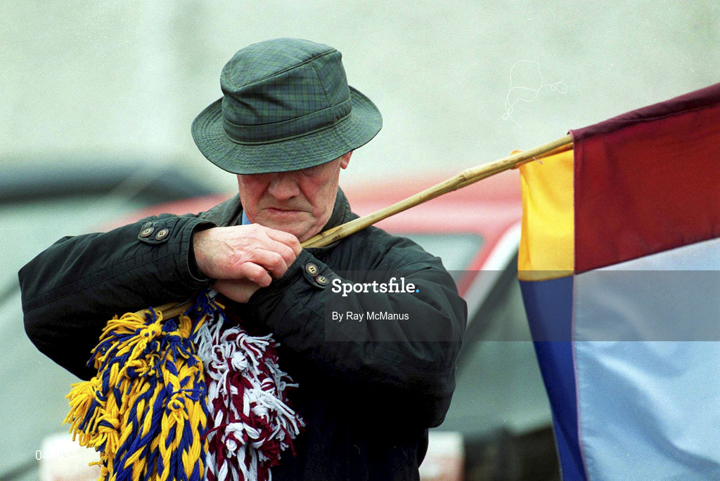 6 February 2000; A flags and headbands seller checks his watch prior to the O'Byrne Cup Final between Westmeath and Longford at Cusack Park in Mullingar, Westmeath. Photo by Ray McManus/Sportsfile