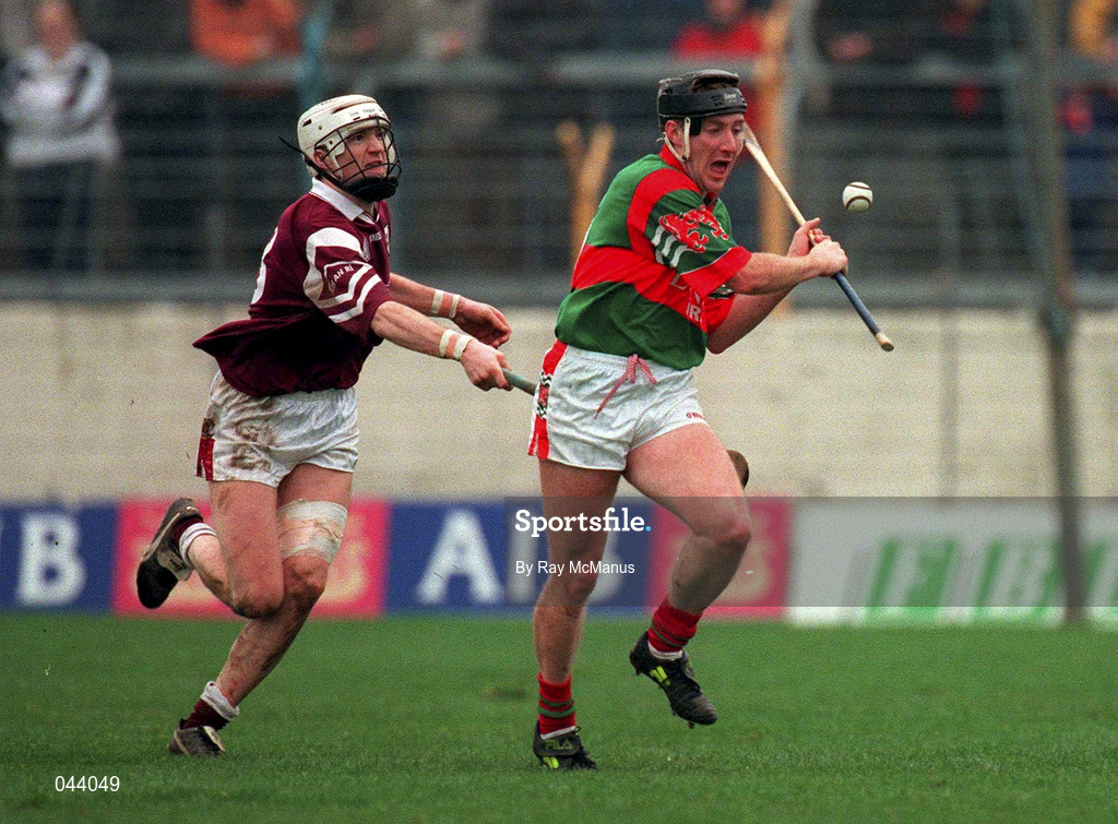 13 February 2000; Brian Whelahan of Birr is chased down by Eamonn Keogh of Athenry during the AIB All-Ireland Senior Club Hurling Championship Semi-Final match between Athenry, Galway, and Birr, Offaly, at Semple Stadium in Thurles, Tipperary. Photo by Ray McManus/Sportsfile